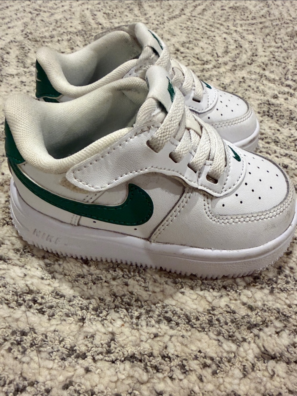 Nike Kids White Sneakers with Green Swoosh Accent